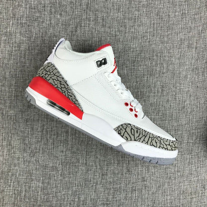 Angled side view showing the grey elephant-print overlays and red accents