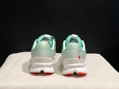 On Cloudsurfer Sneakers in Pale Green and White