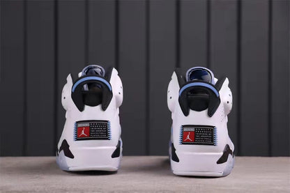 Rear view showing the heel pull tabs, black heel details, and rectangular heel branding patches.