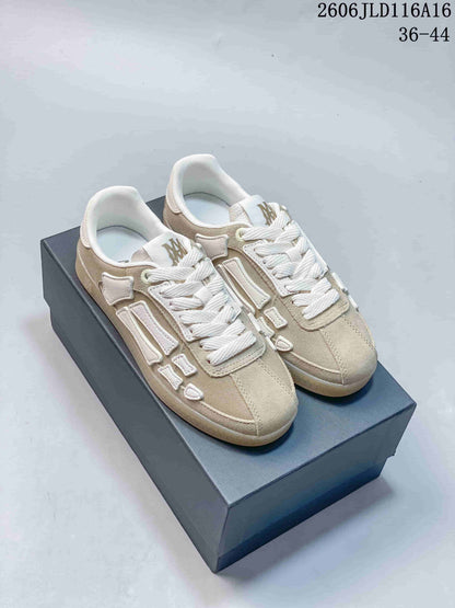AMIRI Pacific Bones Low-Top Sneakers in Beige and White