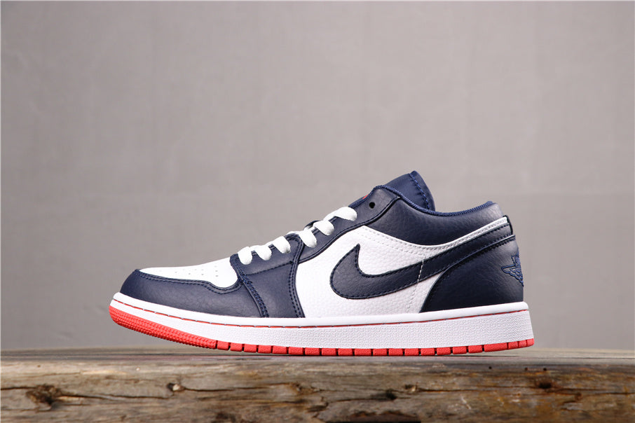 Opposite side profile showing the white toe box, dark blue overlays, Swoosh, white midsole, and red outsole.