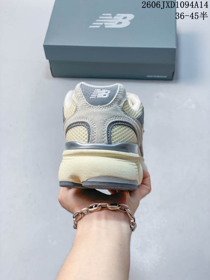 New Balance 603 Low-Top Sneakers in Cream and Gray