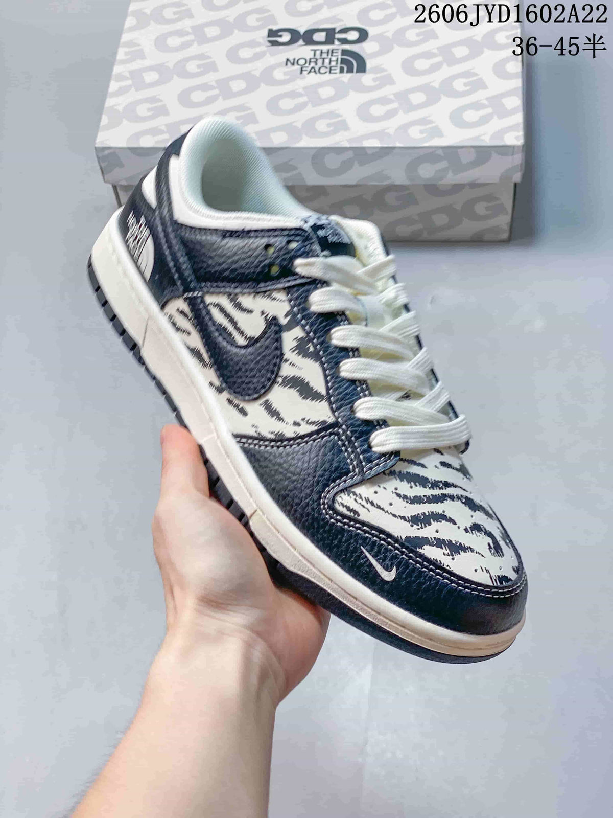 Nike SB Dunk Low Striped White, Blue and Red Sneakers