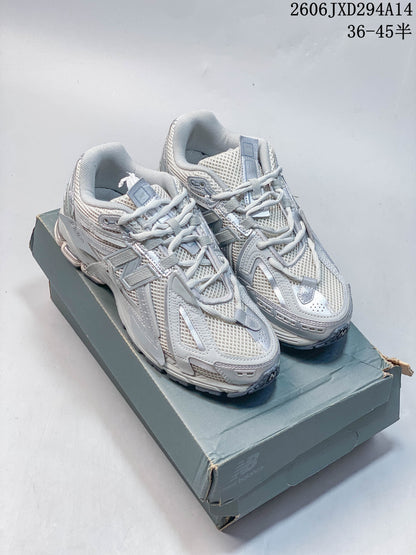New Balance 1906 Sneakers in Silver Grey