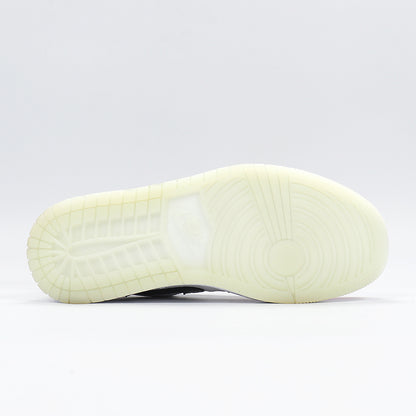 Bottom view showing the translucent light outsole with circular and segmented traction patterns.