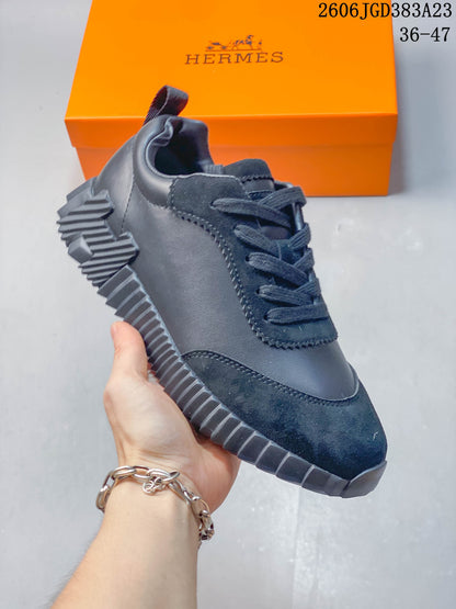 Hermès Low-Top Lace-Up Sneakers in Navy