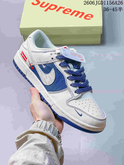 Nike Dunk Low White and Blue Monogram Sneakers