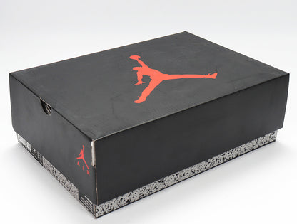 Black Jordan shoebox with red Jumpman logo and speckled gray trim
