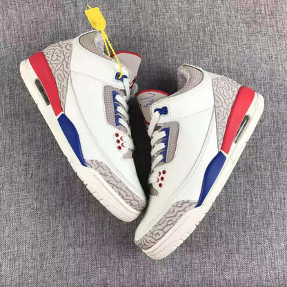 Side view of the pair showing the high-top profile, patterned grey panels, red heel sections, and blue midsole accents.