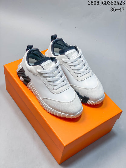 Hermès Low-Top Sneakers in White and Black