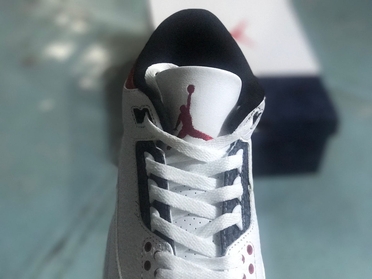 Front view of the Jordan 3 Retro SE tongue and lacing