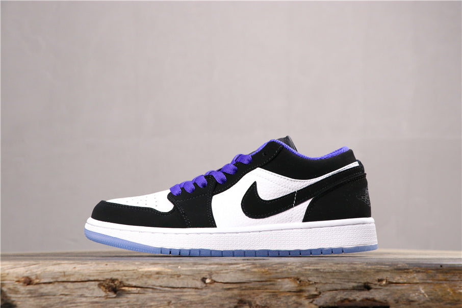 Side profile of the low-top sneaker in white, black, and purple
