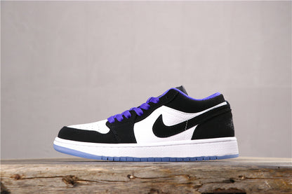 Side profile of the low-top sneaker in white, black, and purple