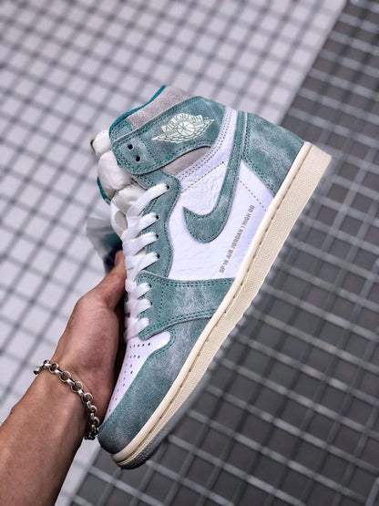 Angled side view highlighting the teal-green collar and overlays, white side panel, winged Jordan branding, and cream-colored midsole.