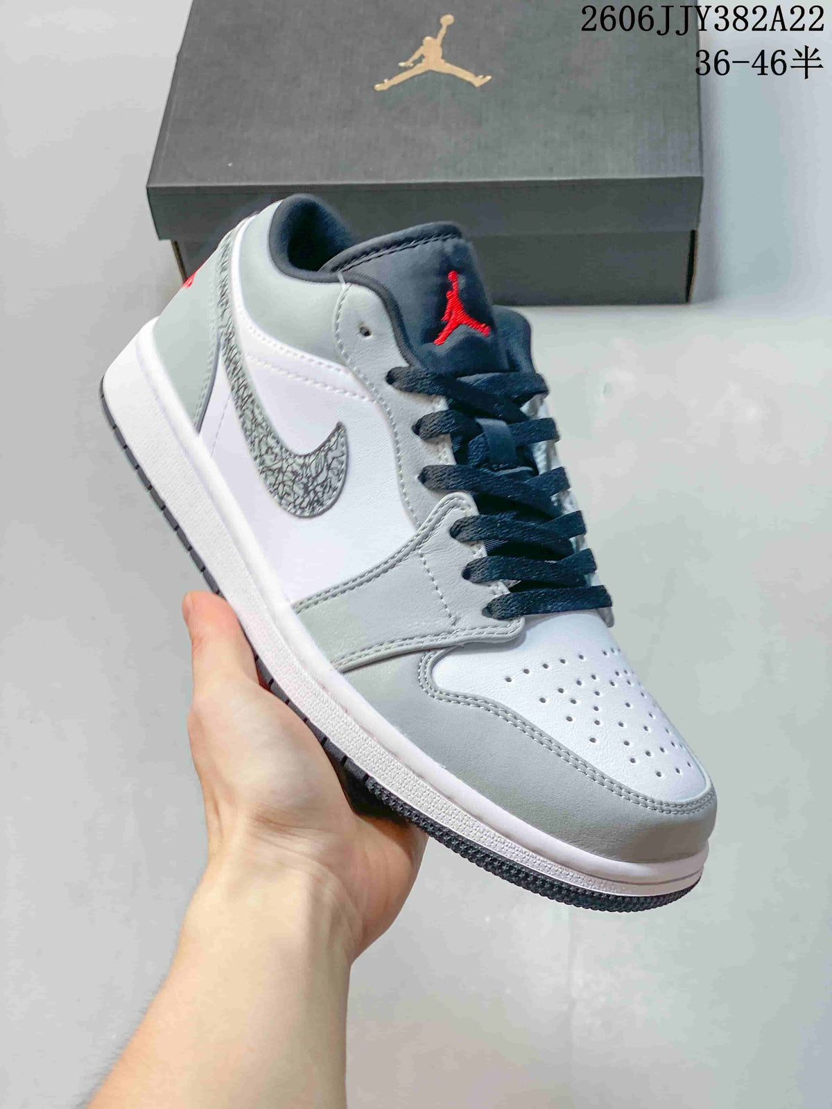 Jordan Air Jordan 1 Low Sneakers in White and Grey