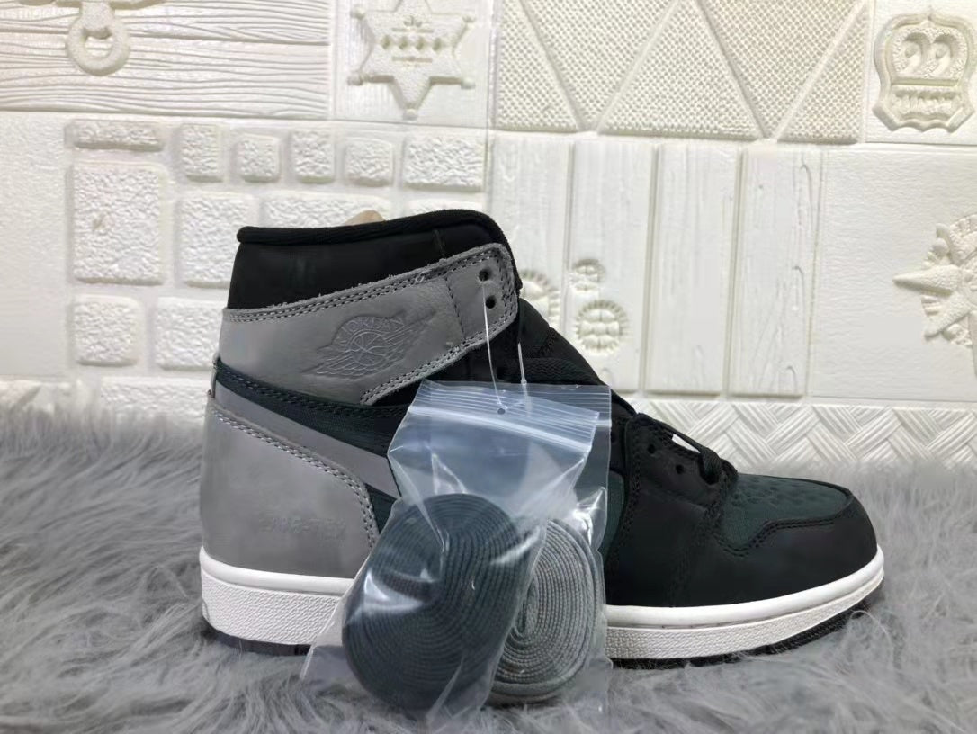 Three-quarter rear-side view of a sneaker with a clear bag containing additional coiled laces.