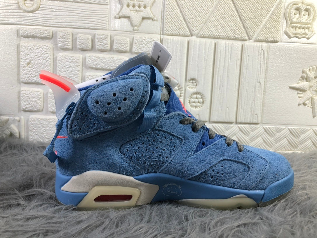 Opposite side profile showing the perforated panels, ankle collar, and layered blue and light-colored sole.