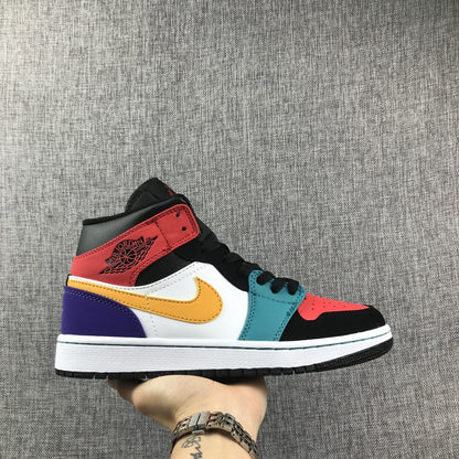 Side view of a multicolor Jordan high-top sneaker with red, teal, yellow and purple panels.