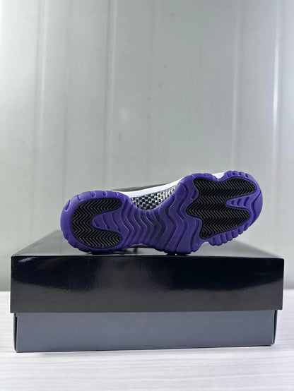 Bottom view showing the purple rubber outsole with black traction sections.