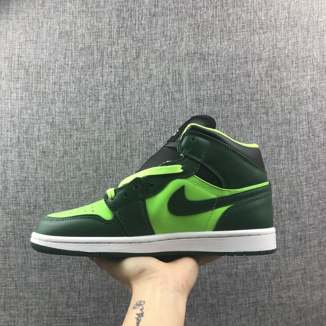 Outer side profile showing the dark green overlays, fluorescent green panels, and black Swoosh detail.