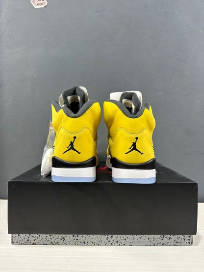 Rear view of the pair showing black heel logos and layered midsoles.