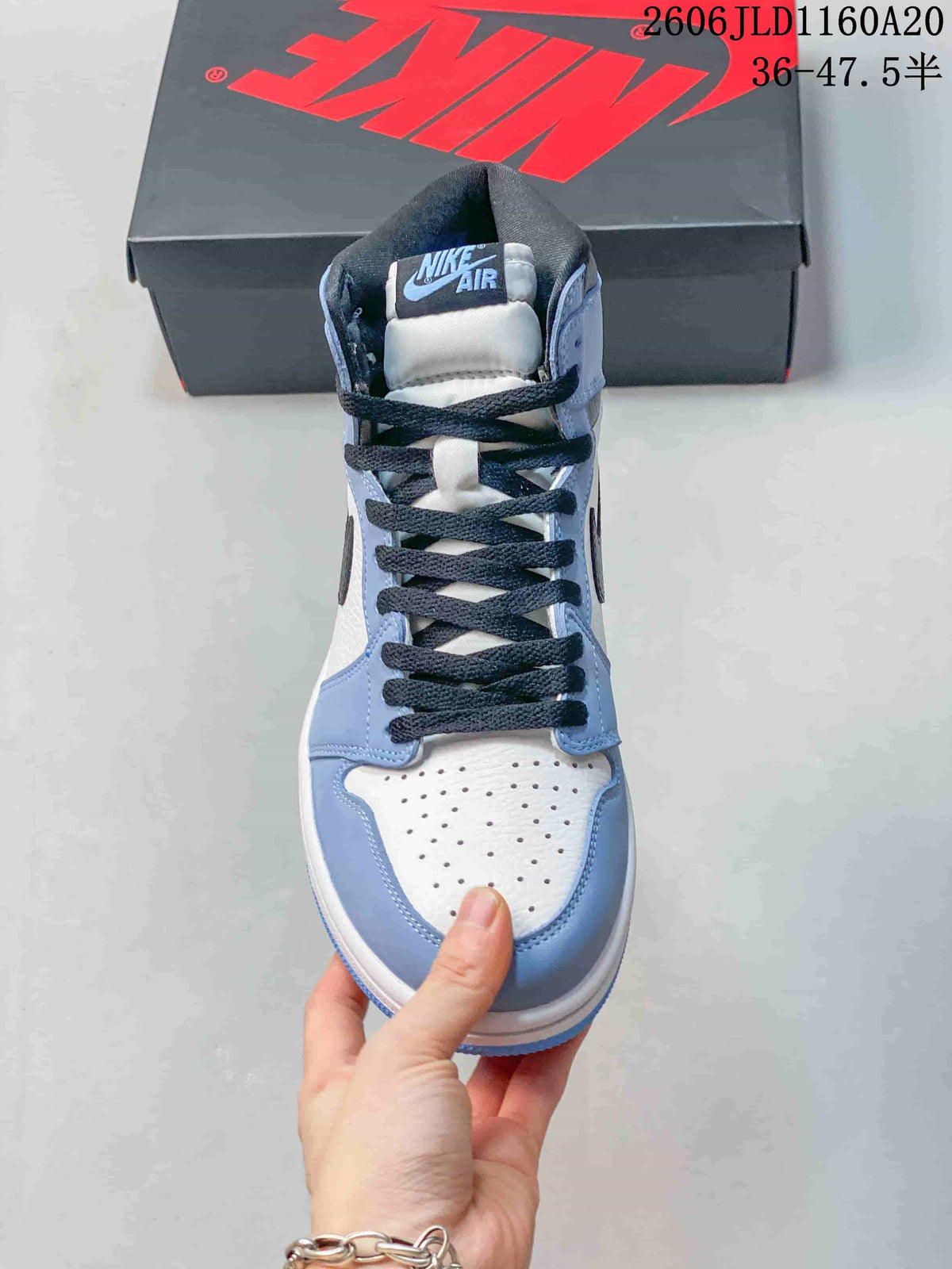 Jordan Air Jordan 1 High Sneakers in Blue and White