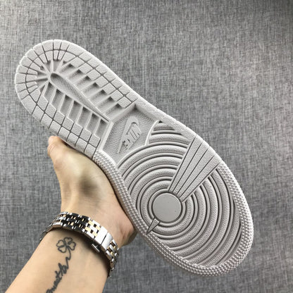 Underside view showing the white rubber outsole with circular and segmented traction grooves.