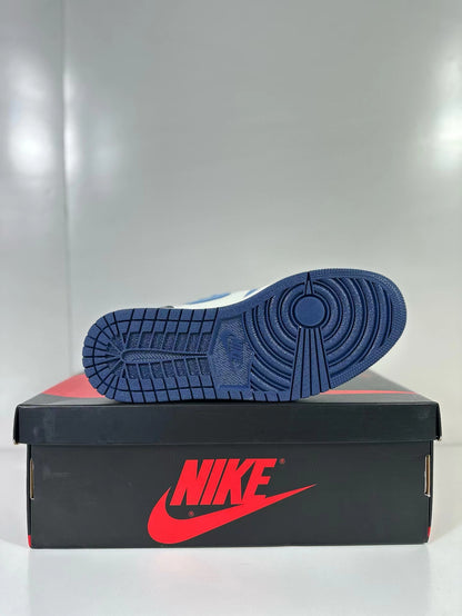 View of the dark navy outsole with circular tread pattern