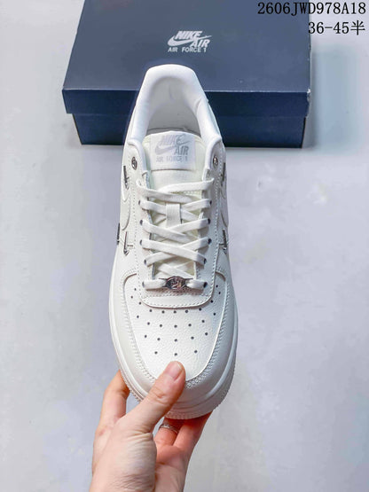 Nike Air Force 1 Low White Sneakers with Metallic Accents
