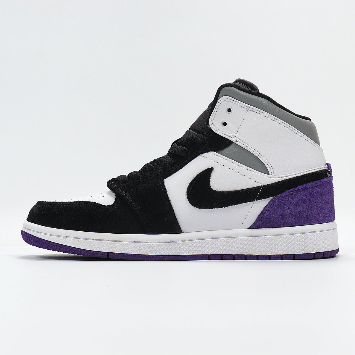 Side profile showing the black swoosh-shaped side mark, white upper panels, purple heel panel, and white midsole.