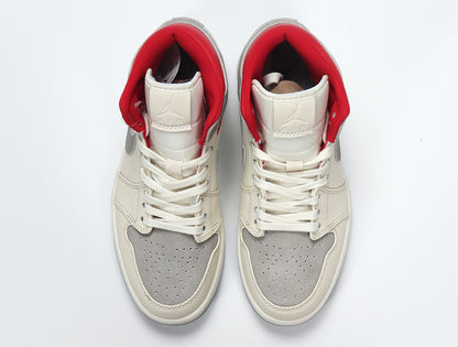 Top view of a pair of grey, white and red high-top sneakers with white laces.