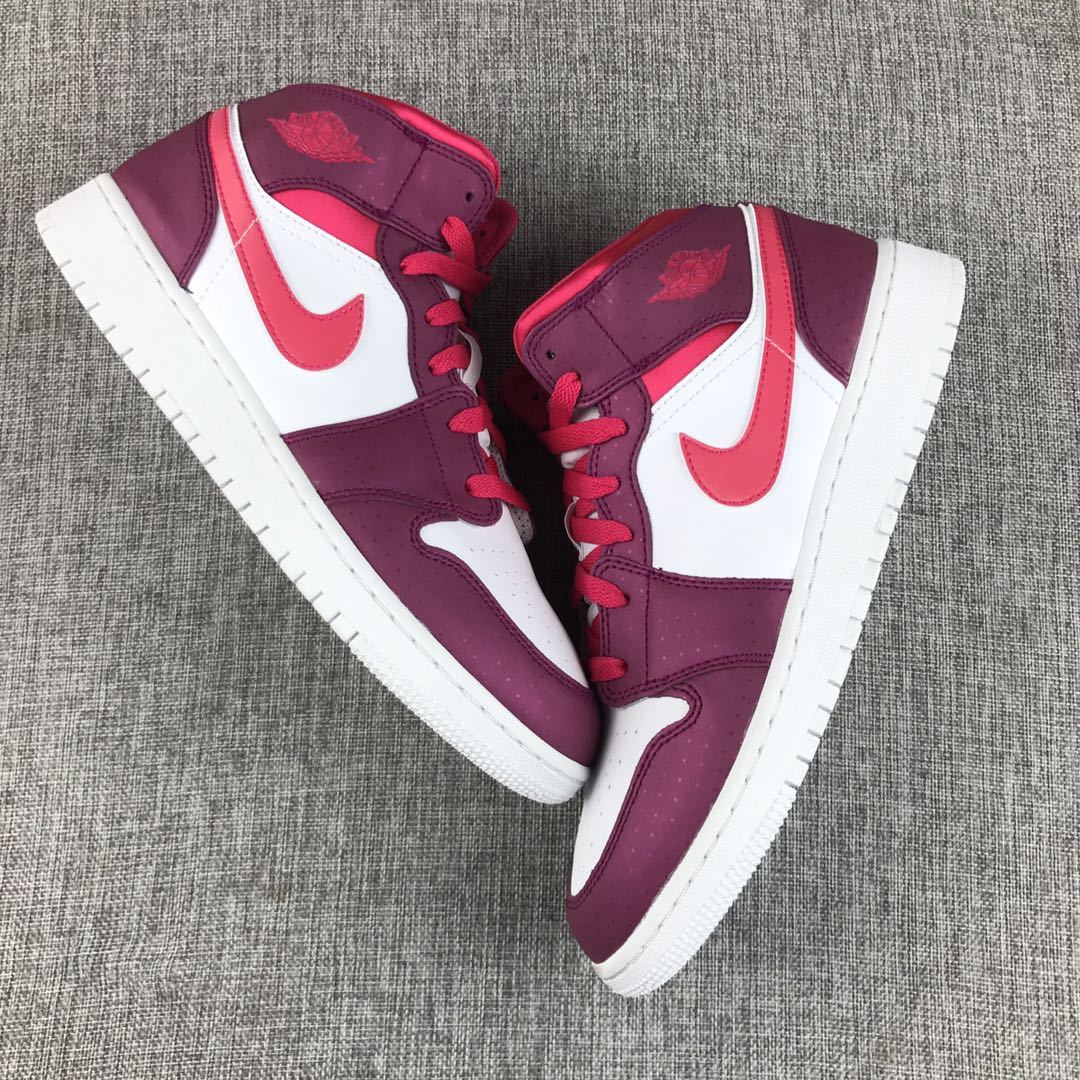Top-down view of the pair showing burgundy overlays, white panels, and pink laces.