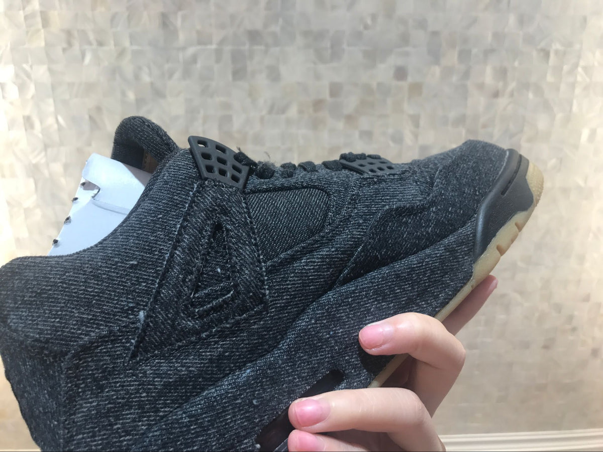 Side detail showing the layered black upper and wing-style side panel.