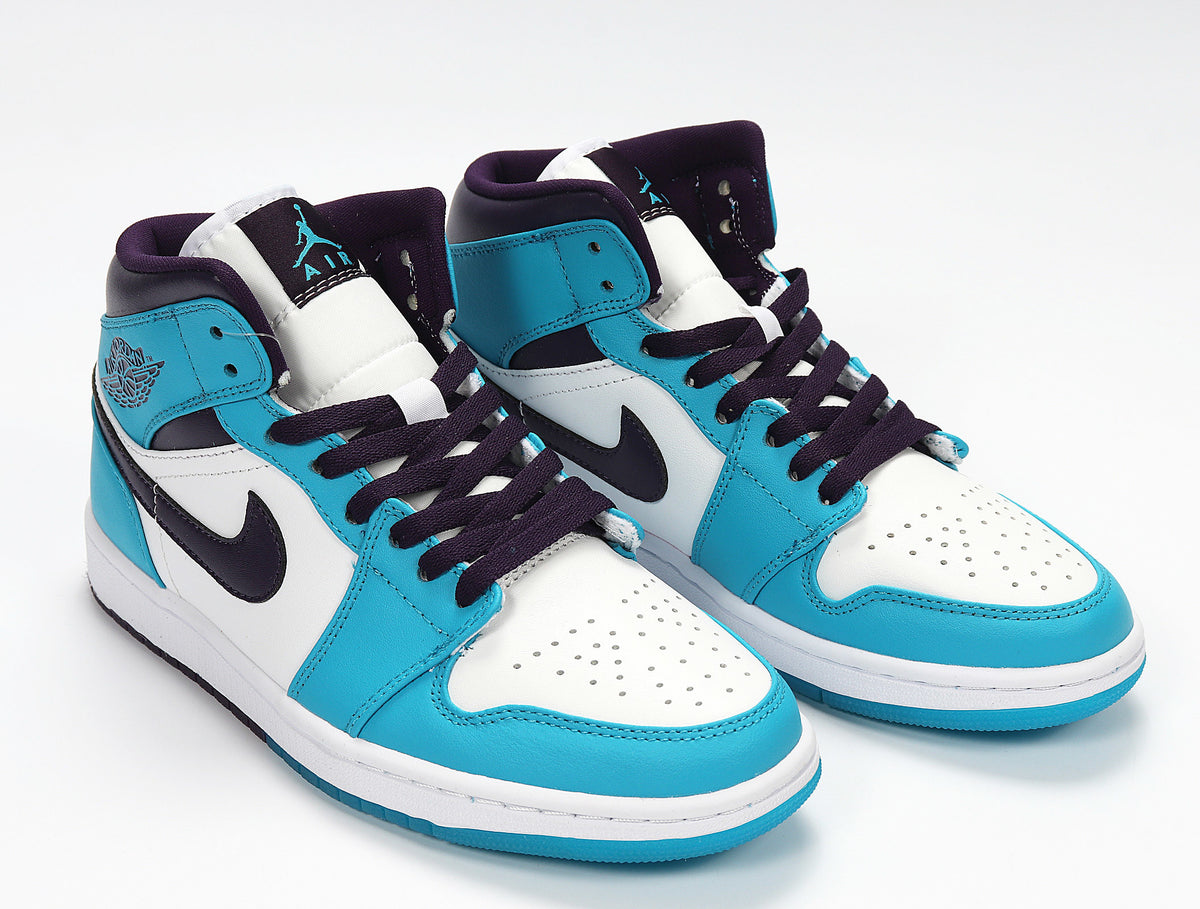 Pair of high-top sneakers in white, aqua blue and dark purple, shown from a front three-quarter angle.