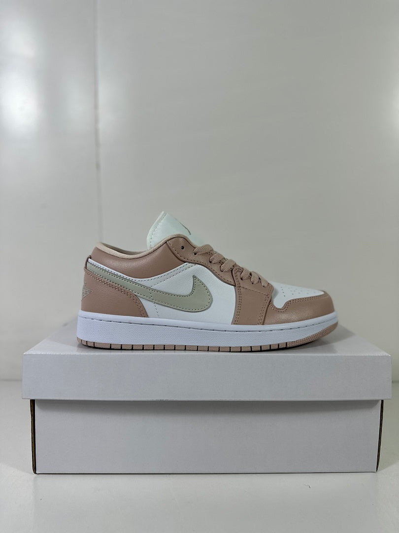 Side profile of a Jordan Air Jordan 1 Low sneaker on a white shoebox.