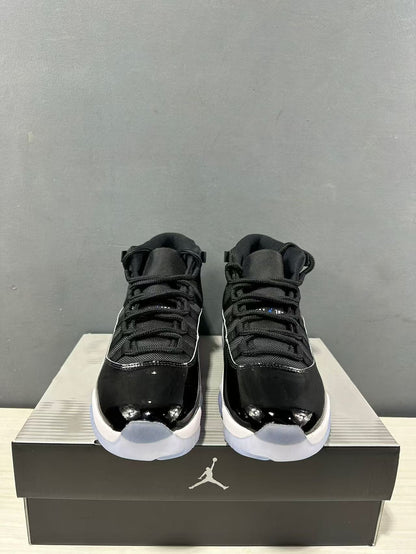 Front view of the pair showing the high-top collars, black laces, and glossy black toe sections.