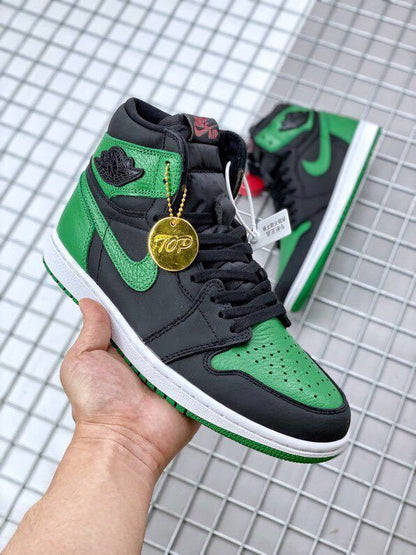 Front three-quarter view showing the green toe box, black overlays, laces, and collar branding.