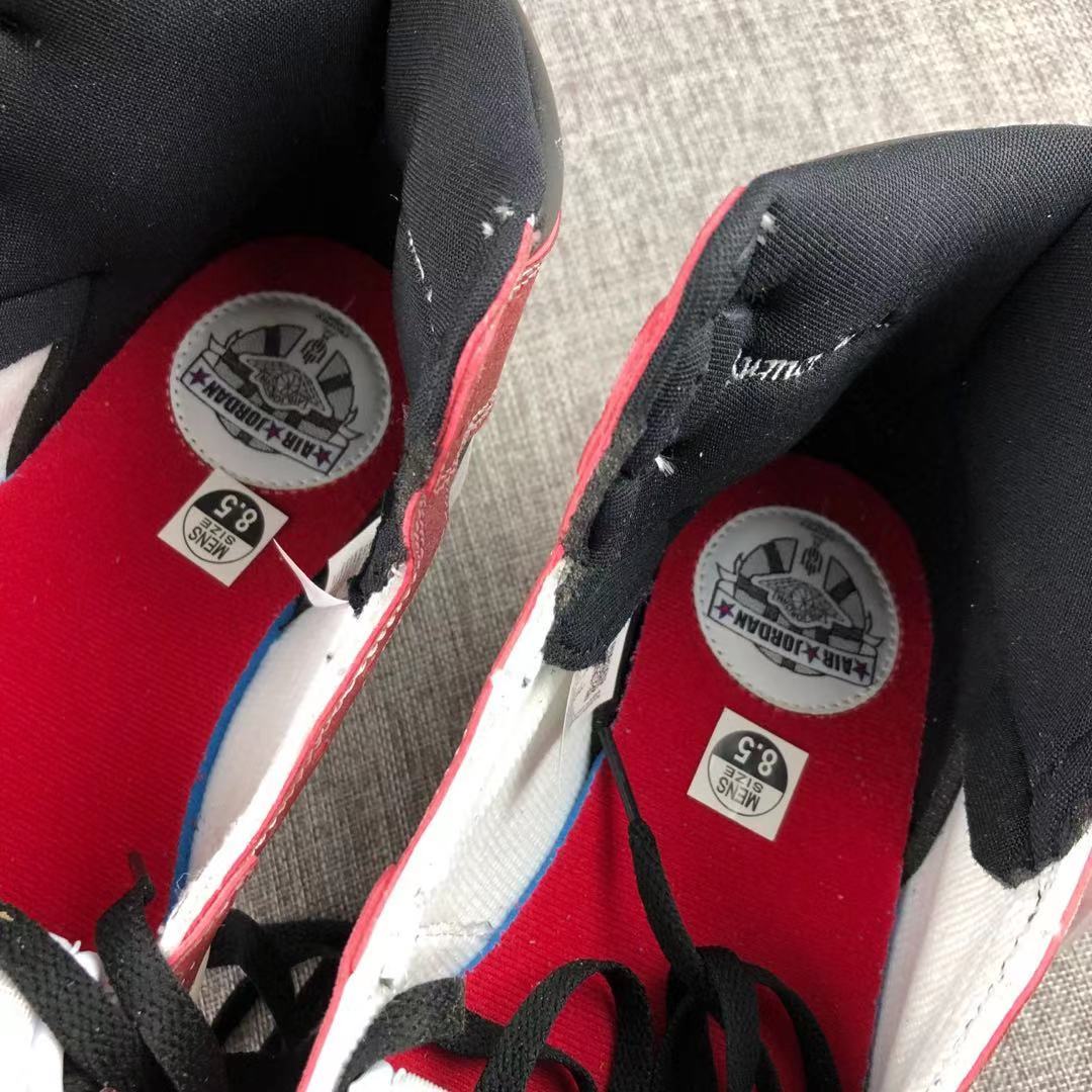 Top view showing the red insoles, black lining and tongue labels marked 8.5.