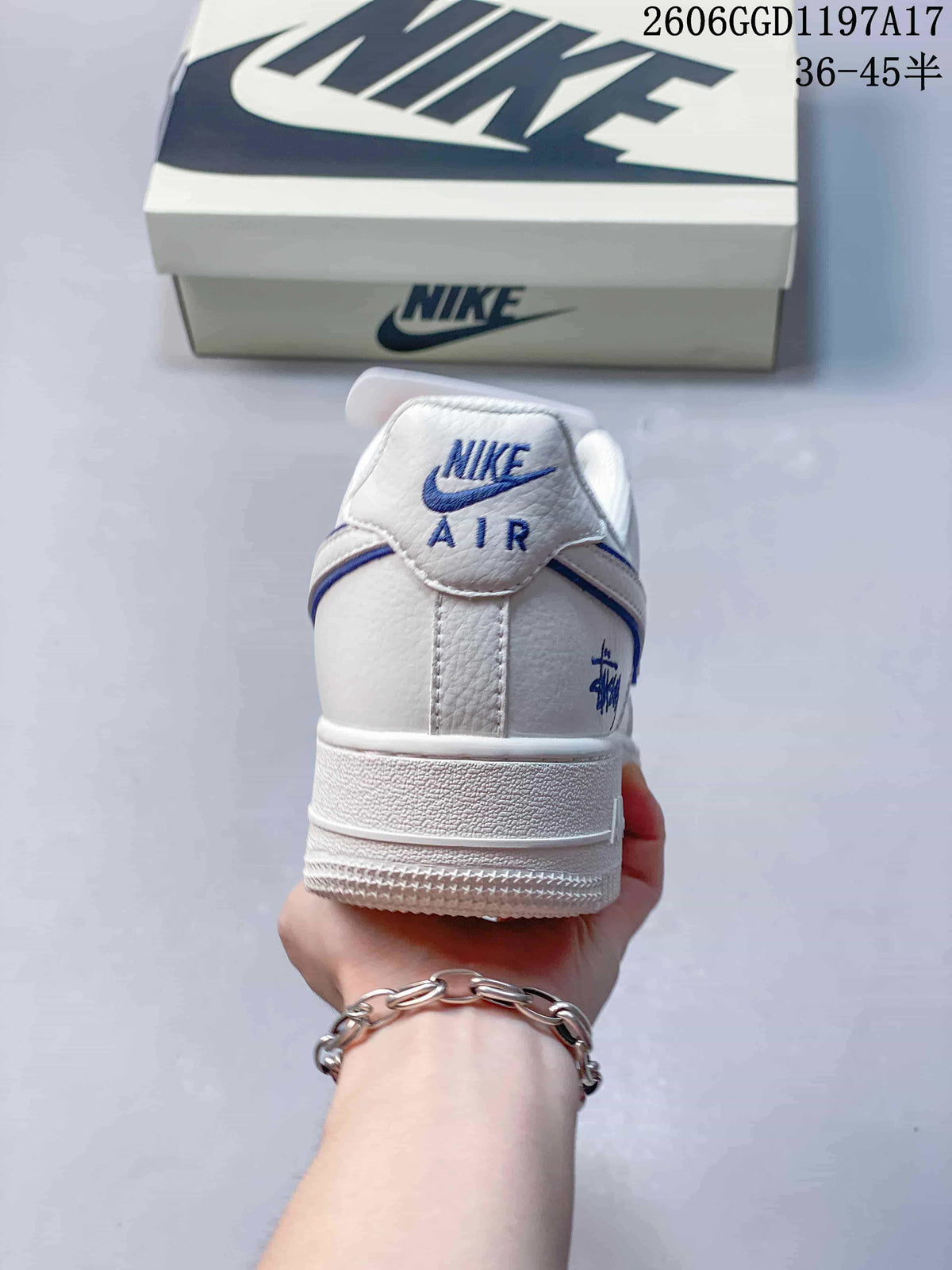 Nike Air Force 1 Low x Stüssy White and Navy Sneakers