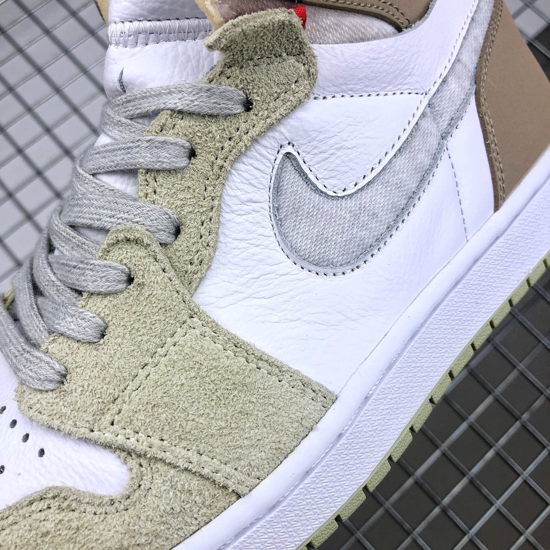 Close-up of the sneaker upper showing the textured olive green overlay, gray Swoosh, white panel, and stitching.
