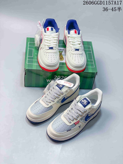Nike Air Force 1 Low Cream and Blue Monogram Sneakers