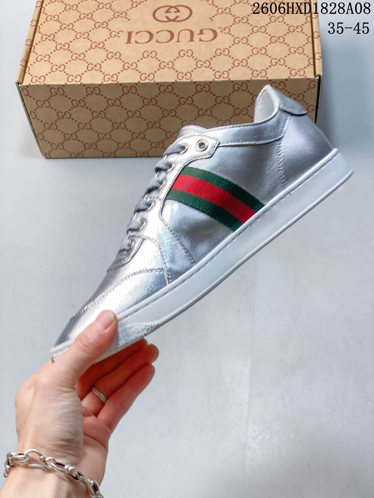 Gucci Silver Low-Top Sneakers with Green-Red Web Stripe