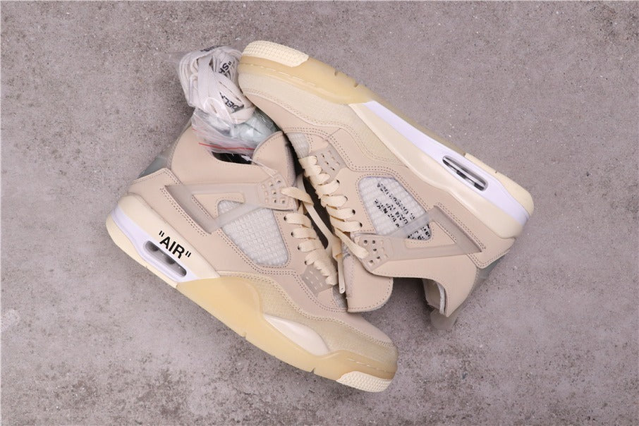 Top and side view of cream high-top sneakers showing translucent side panels, printed midsole details, and additional laces.