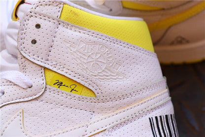 Close-up of the embossed winged basketball emblem and yellow side detail.
