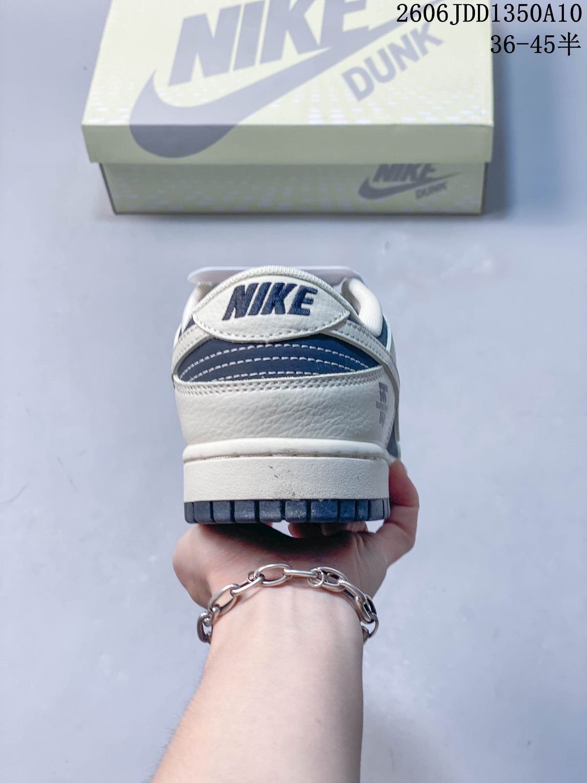 Nike SB Dunk Low Sneakers in Navy and Off-White