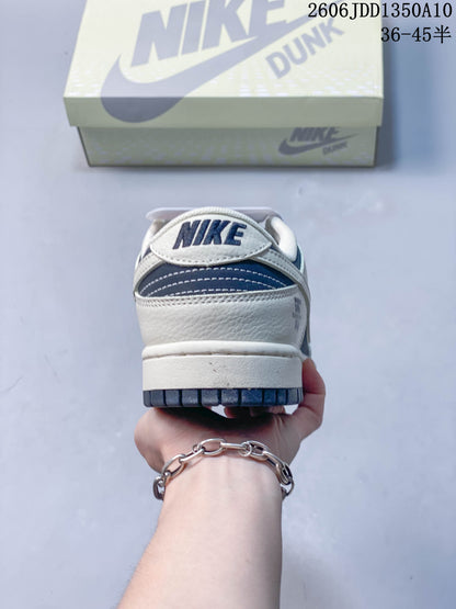 Nike SB Dunk Low Sneakers in Navy and Off-White