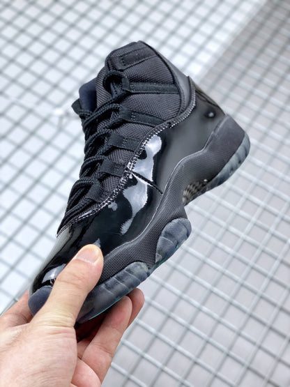 Rear-side close-up showing the black glossy heel panel and textured dark midsole and outsole.