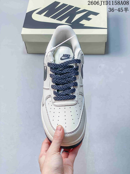 Nike Air Force 1 '07 Low Sneakers in White and Navy