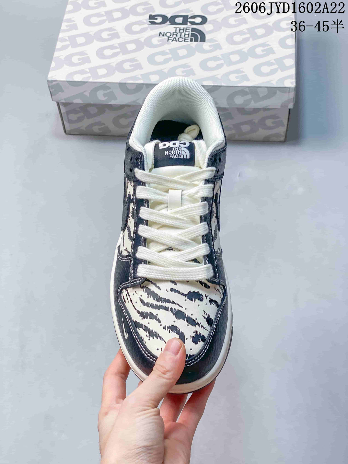 Nike SB Dunk Low Striped Cream and Navy Sneakers