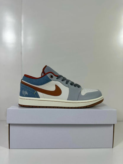 Side profile highlighting the contrasting upper panels and brown outsole